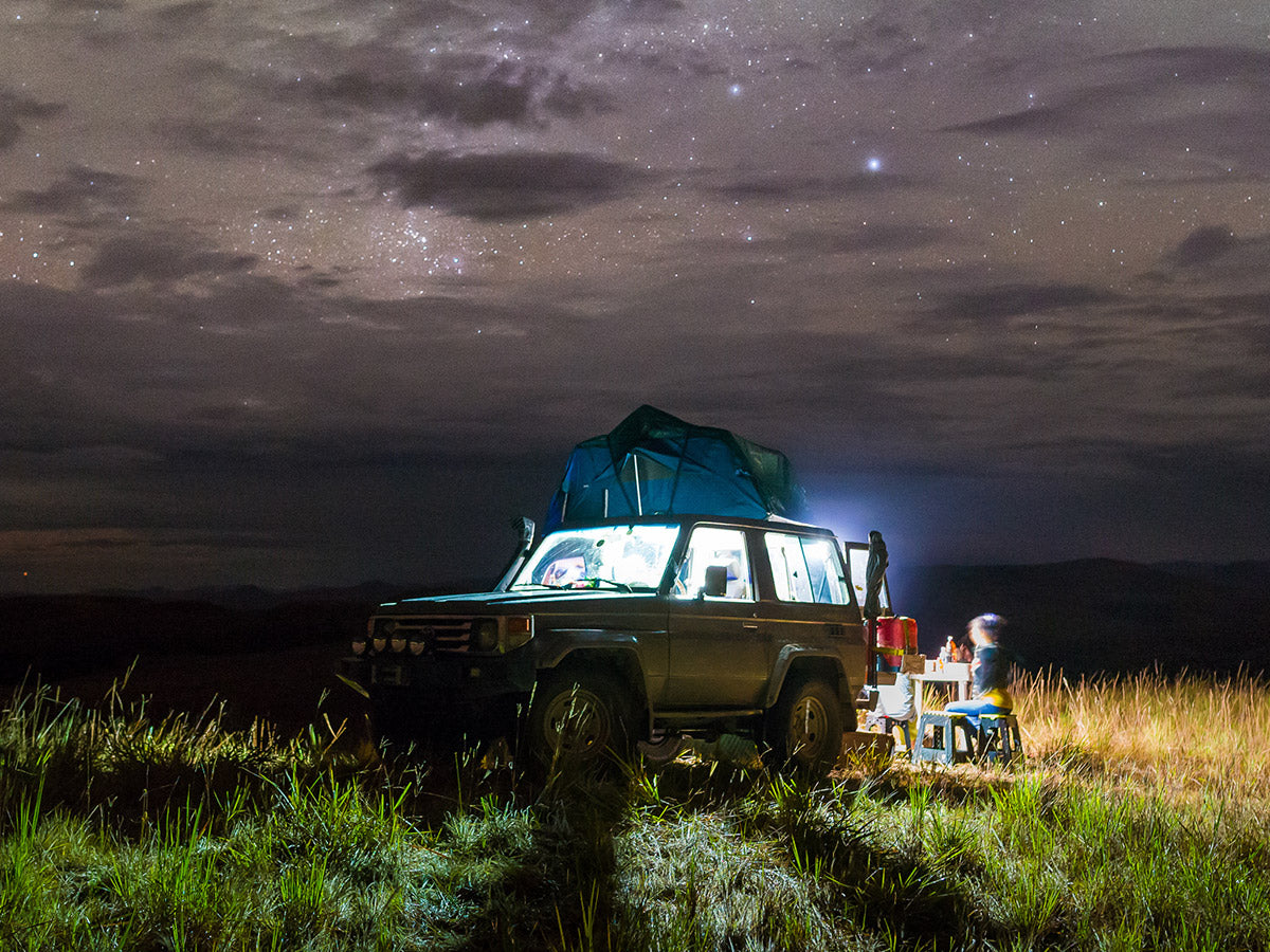 overlanding vehicle under night sky, overland battery